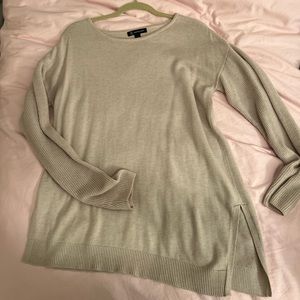 Asymmetrical sweater with side slit